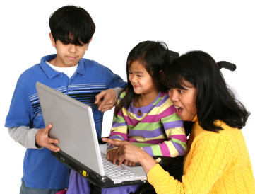 girl in a wheelchair holding laptop looking happy with family