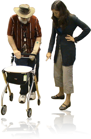 therapist showing client how to use walking aid correctly